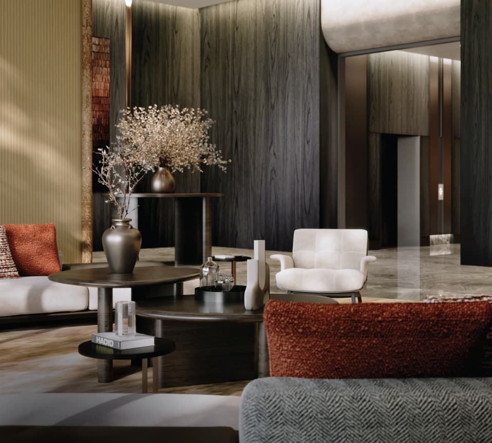 A seating area in the Enlace Suites II lobby, in timber, bronze and cream stone