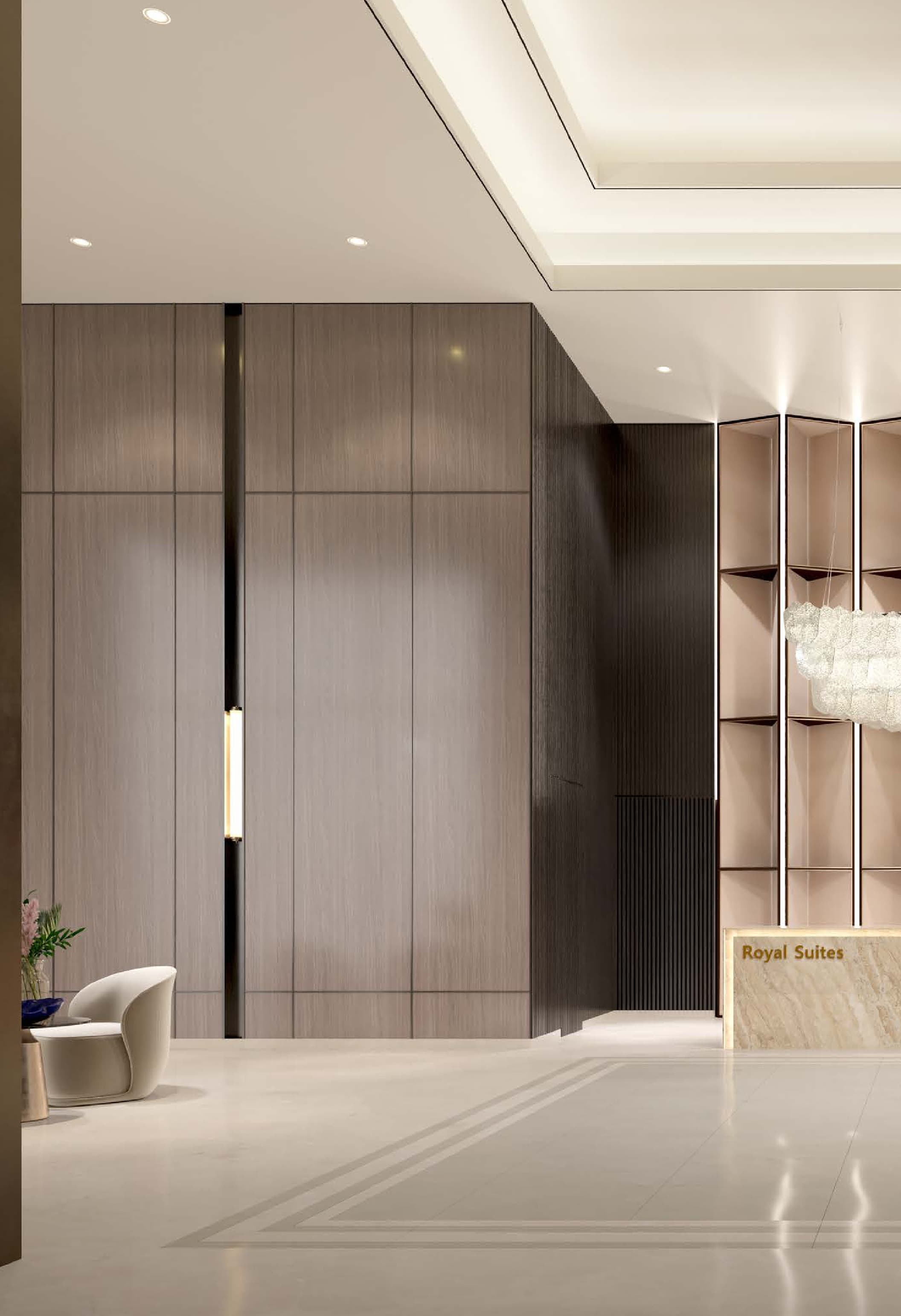 Royal Suites — the double-volume arrival lobby with its marble concierge desk