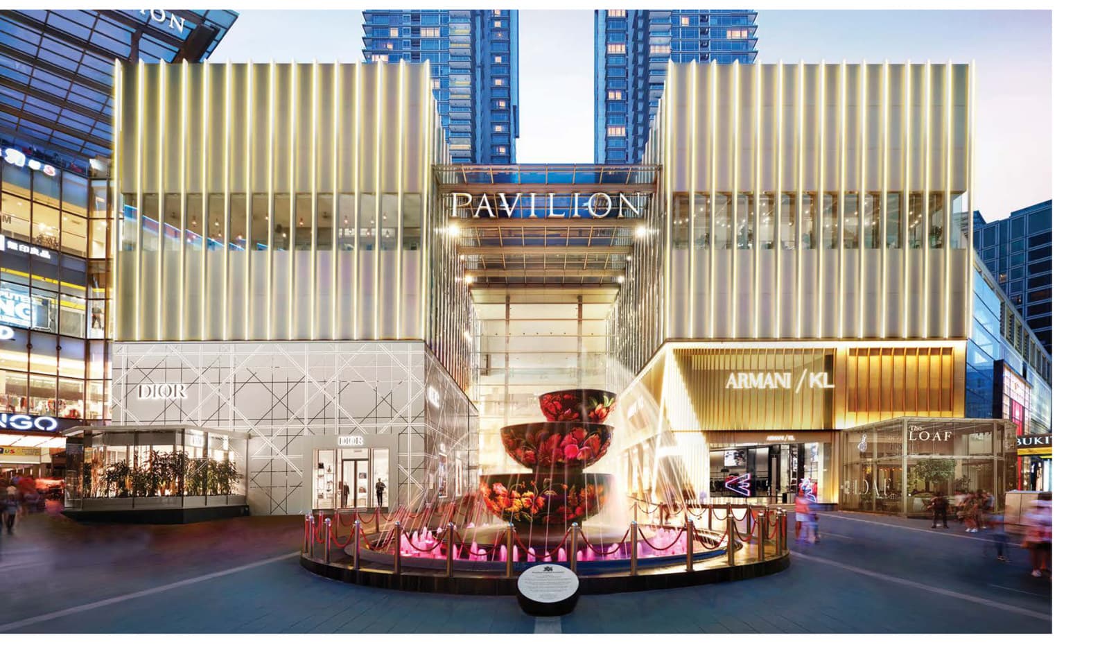 Pavilion Kuala Lumpur — the mall's Jalan Bukit Bintang entrance under its fluted gold canopy, with the Crystal Fountain in the forecourt