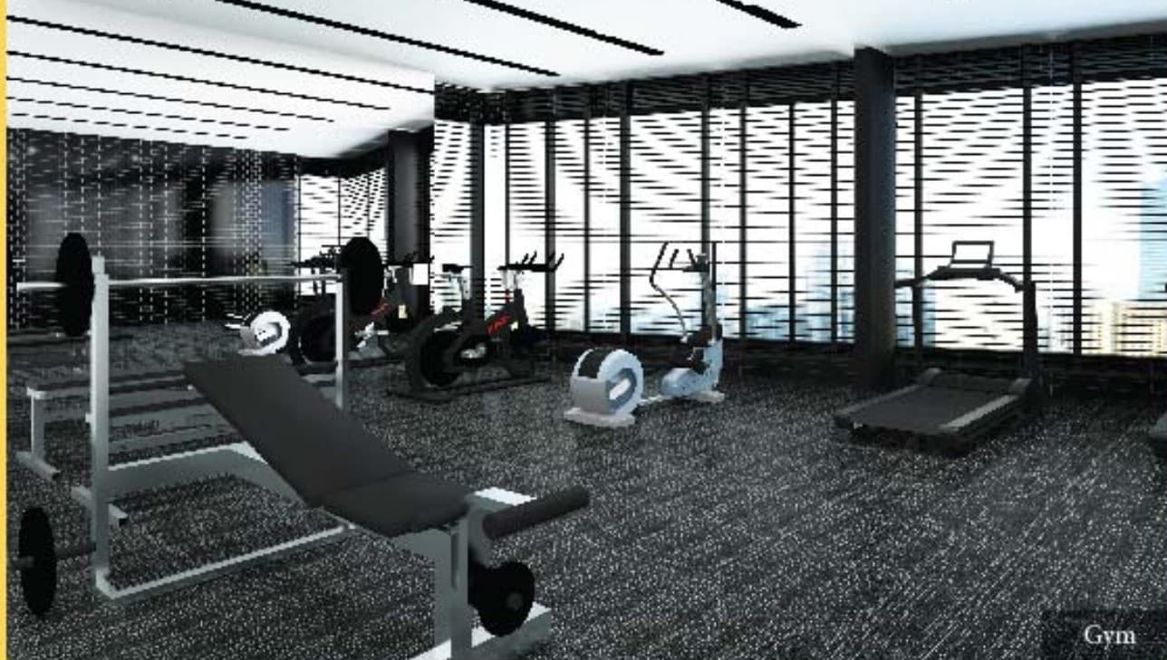 The gym — weights and cardio behind the podium's patterned screen wall