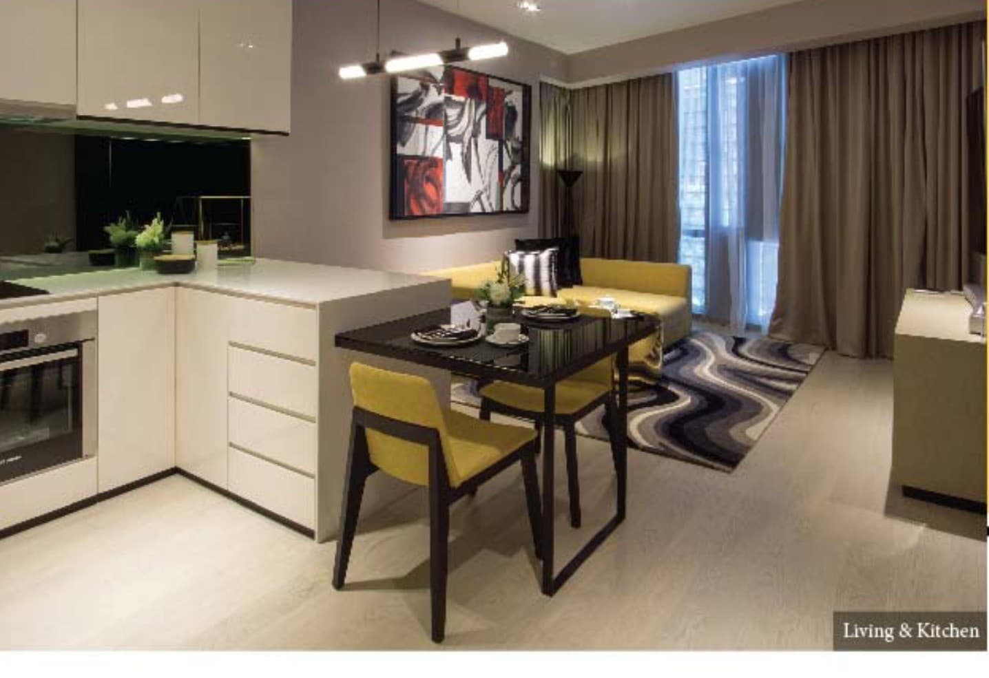 Ascott Star Residence furnished living and kitchen — L-shaped kitchen with built-in oven, dining table in the brochure's yellow accent chairs, sofa and lounge beyond