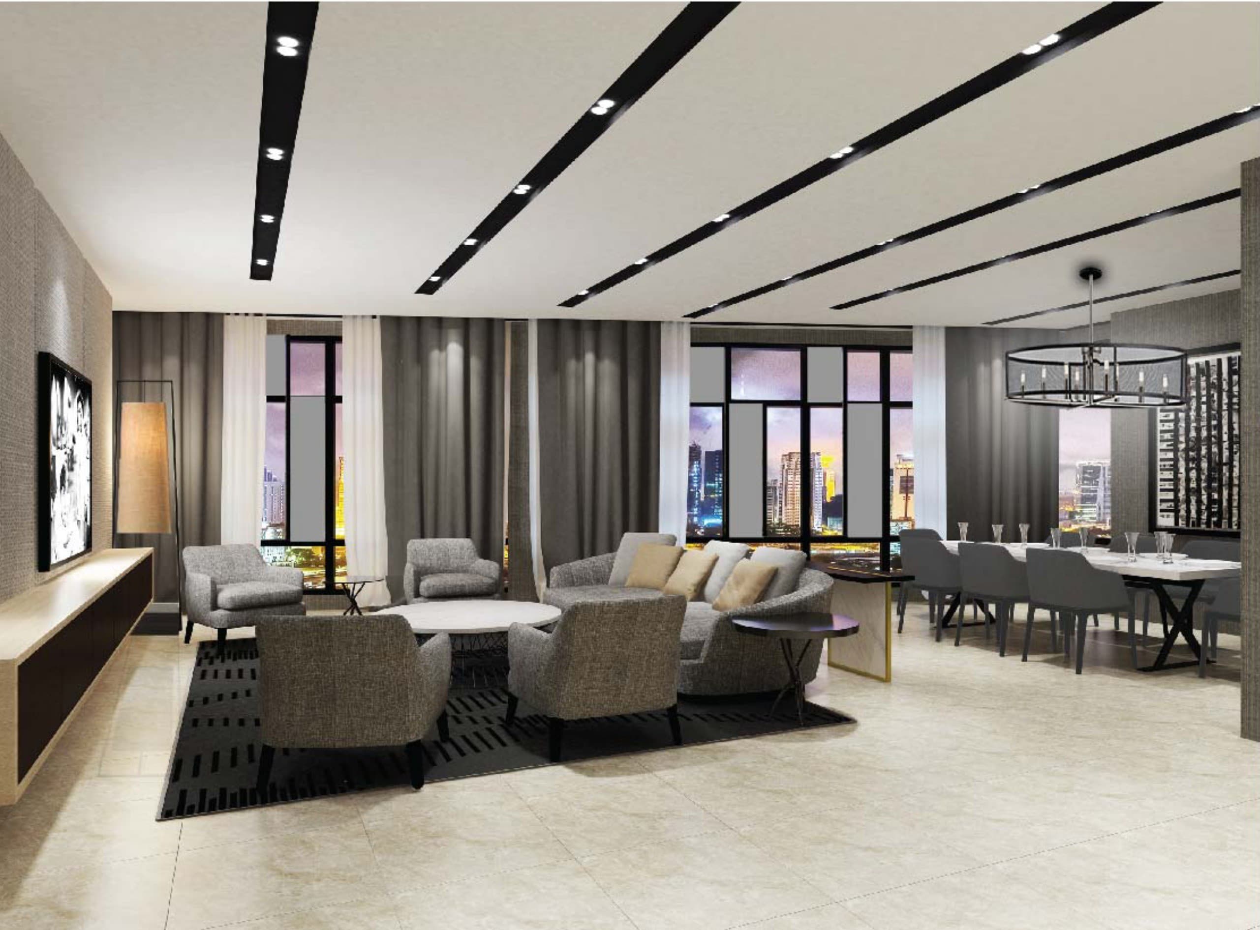 The residents' lounge — lounge and dining seating against the city glass, one of the privileged-access spaces
