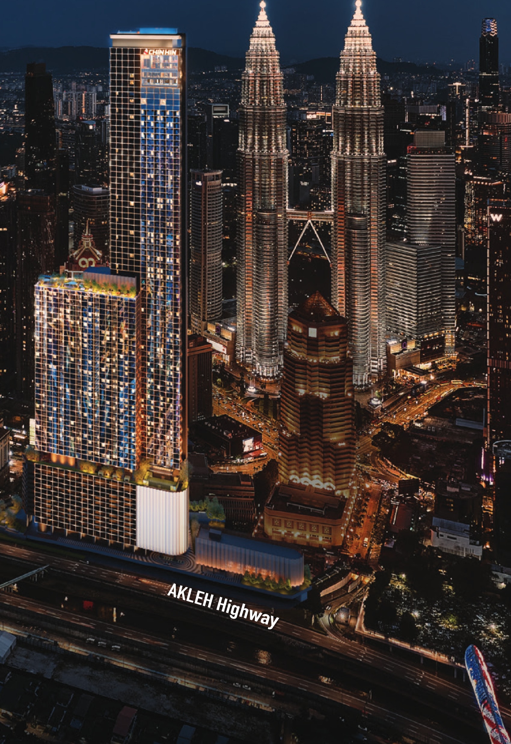 Divine KLCC — the 84-storey tower lit at night beside the Petronas Twin Towers, seen from above the AKLEH highway with the Kuala Lumpur skyline behind it