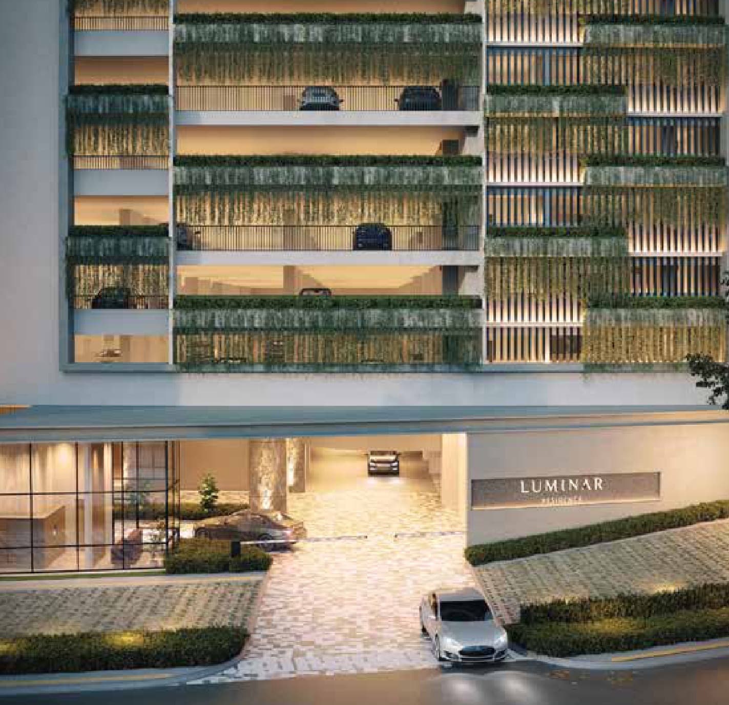 The covered drop-off and lift lobby, under the planted car-park screen