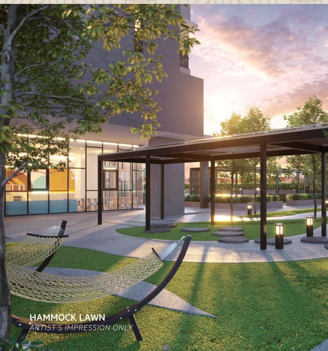 The hammock lawn beside the pavilion, planted and lit for the evening