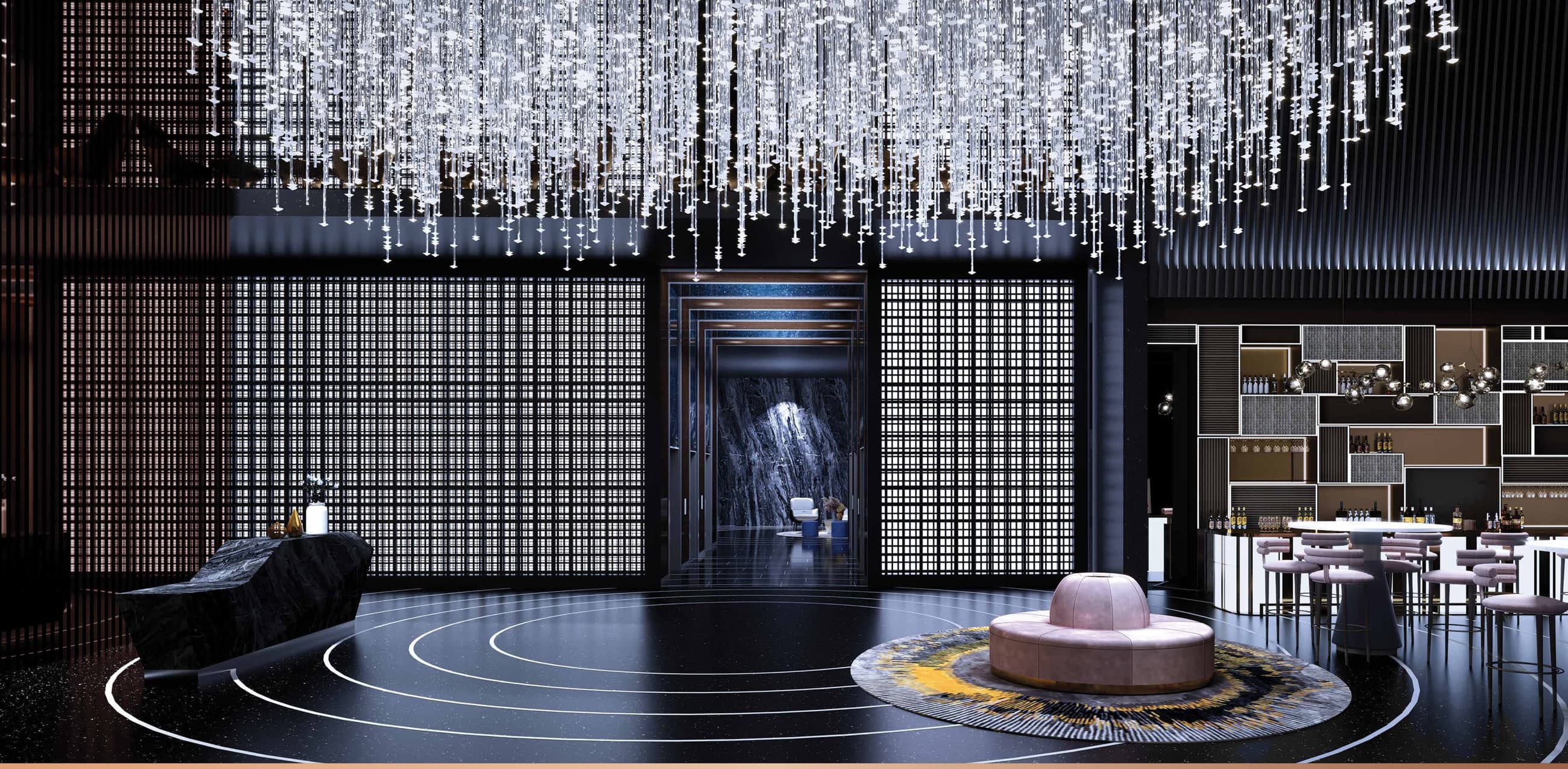 The galaxy-inspired ground lobby — a cascading crystal ceiling over the reception, coffee house and residents' lounge