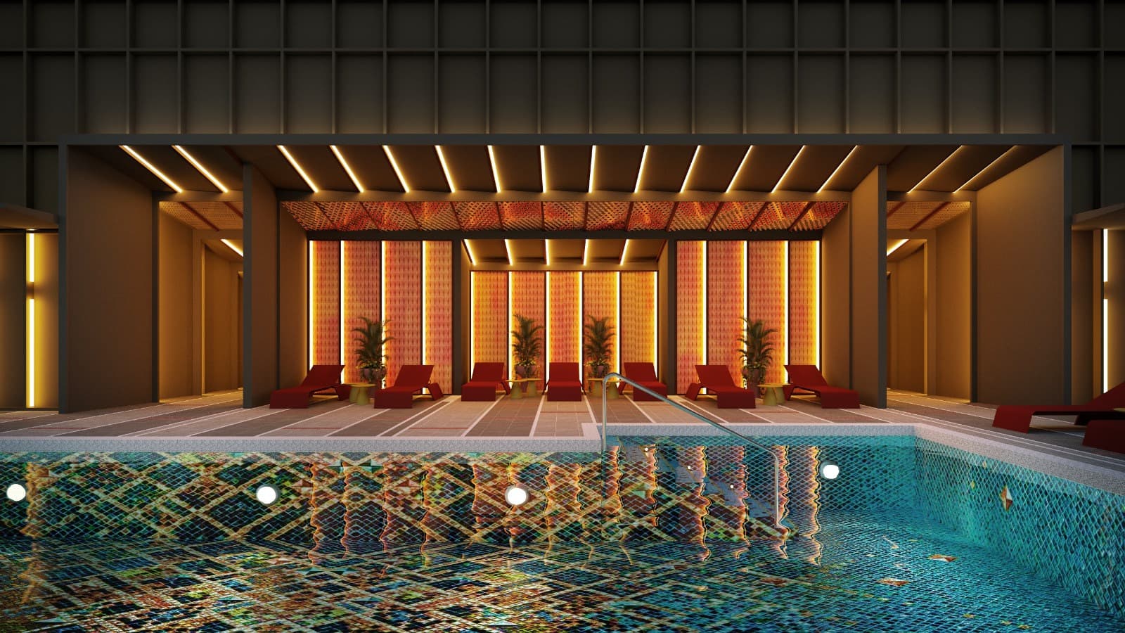The pool deck at night — loungers set against a wall of backlit amber screens, under a lit pergola, with the mosaic tiling reflected in the water