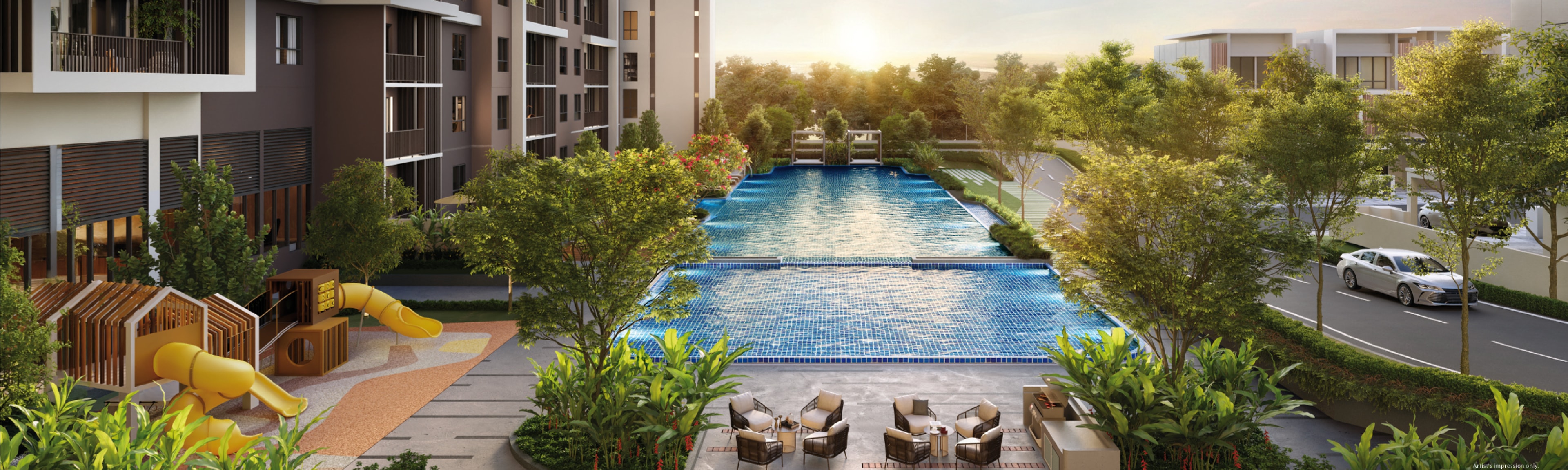 RIA @ Sunsuria Kwasa Damansara — the swimming pool and wading pool between the two 21-storey blocks, with the children's playground on the left and the terraced homes beyond