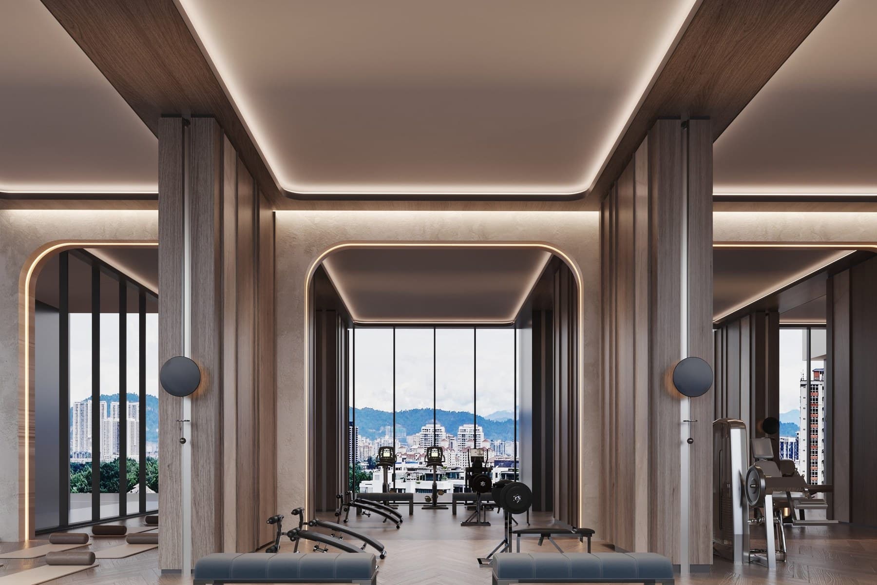 Fitness Lounge — the Level 8 gymnasium, arched timber bays down both sides and cardio equipment set against a glazed wall over the city