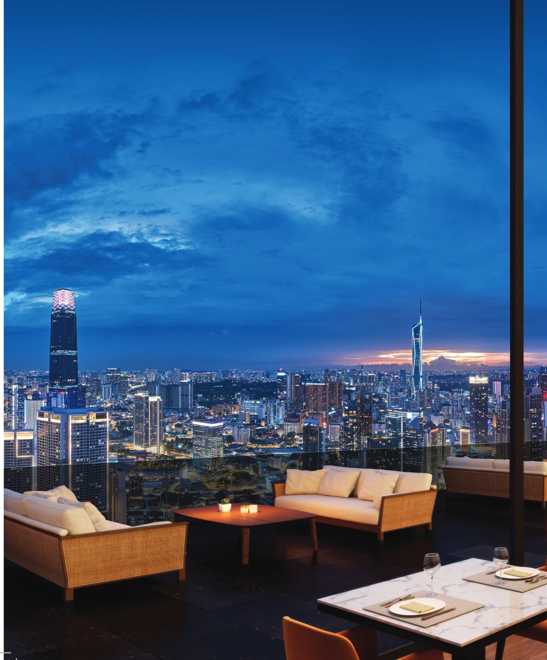 The Level 50 sky dining terrace at dusk — lounge and dining tables with the skyline from KL Tower to Merdeka 118