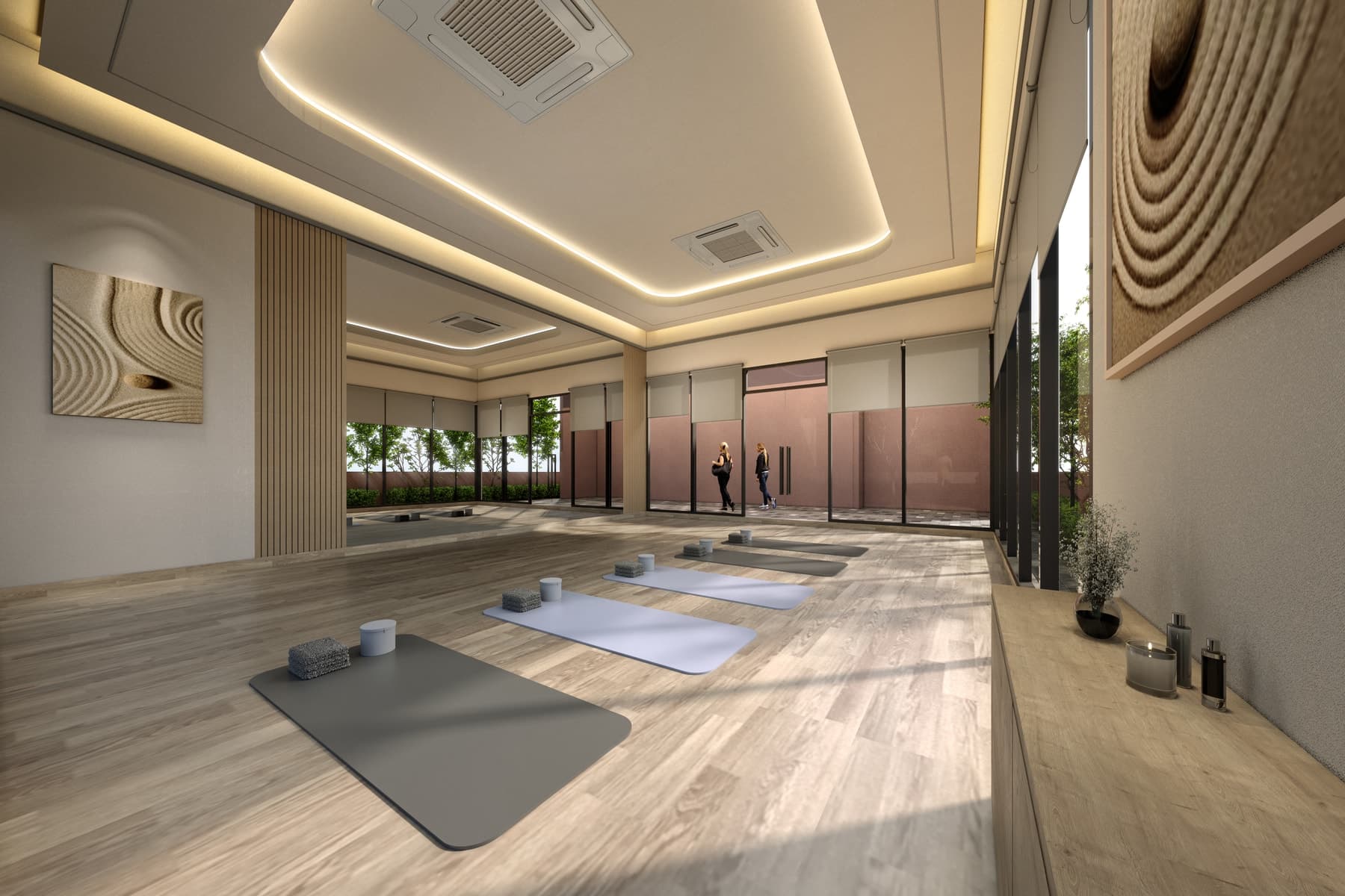 The yoga studio, timber-floored and daylit, with the fluted acoustic wall behind