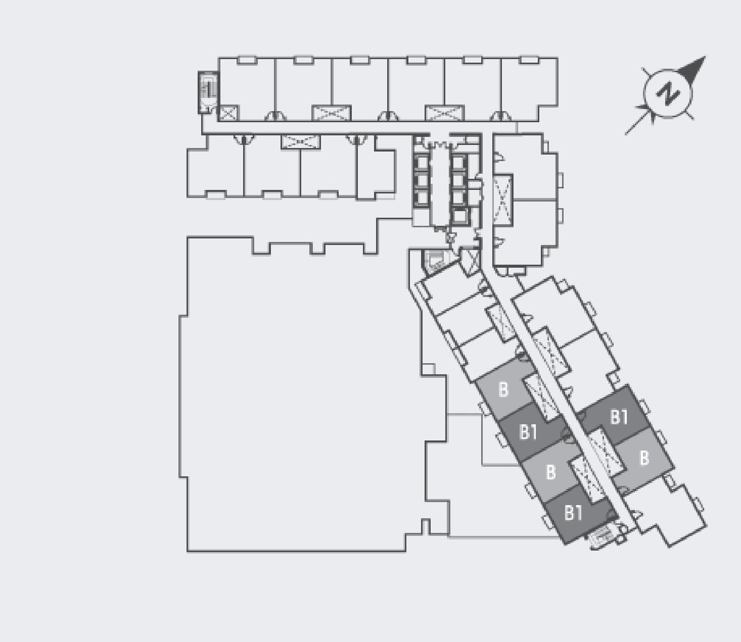 Tujuh Residences typical floor plate with the Type B stacks shaded — Six stacks filling the lower south-east wing — B, B1, B, B1 down the inner face and B1, B on the outer