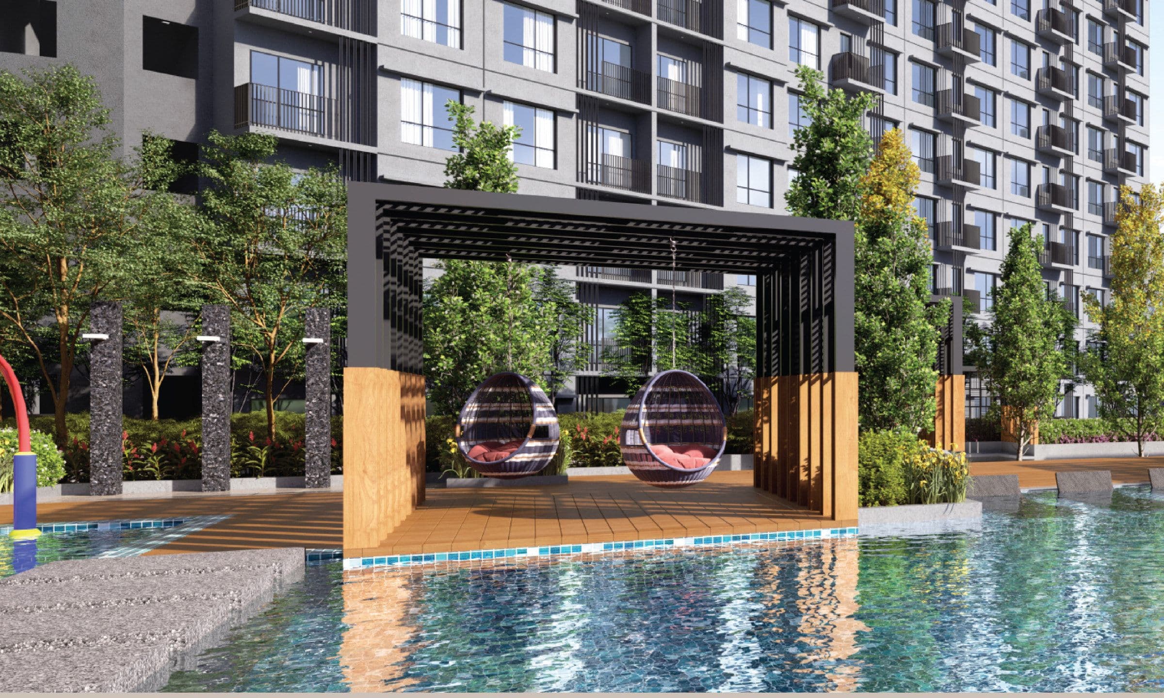 The swimming pool on the Level 10 podium, with the hanging chairs and cabana deck set into the water